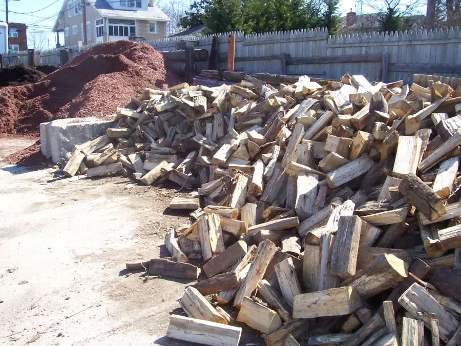 A pile of wood that is piled up on top of each other.